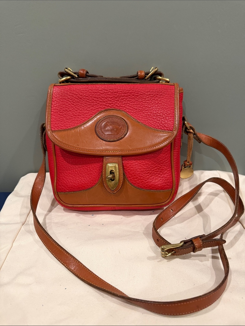 Dooney & Bourke Red and Brown Pebbled Leather Crossbody